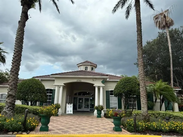 a view of a livingroom with furniture and a flat screen tv