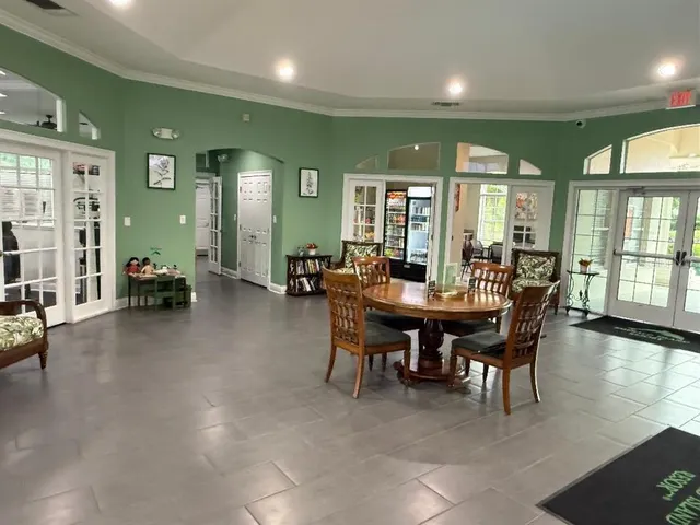 a room with stainless steel appliances lots of counter space and window