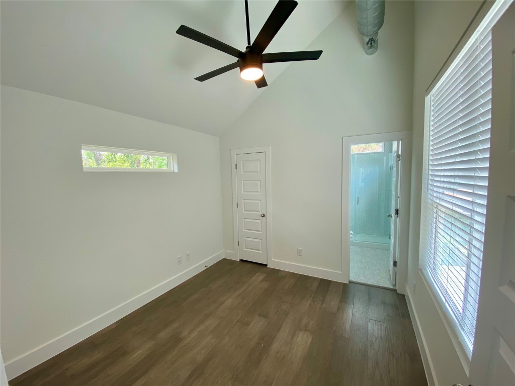 2500 Sweeney Lane, Unit B BACK HOUSE Austin, TX 78723 - Photo 13 of 17 an empty room with wooden floor and windows