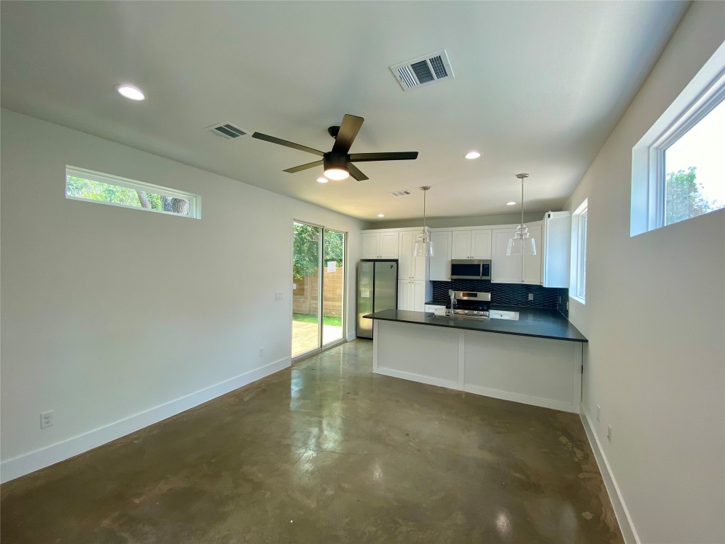 2500 Sweeney Lane, Unit B BACK HOUSE Austin, TX 78723 - Photo 3 of 17 a view of a kitchen with a sink and a window
