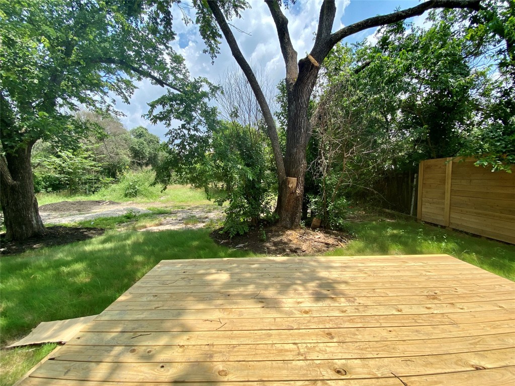 2500 Sweeney Lane, Unit B BACK HOUSE Austin, TX 78723 - Photo 7 of 17 a view of a yard with plants and trees