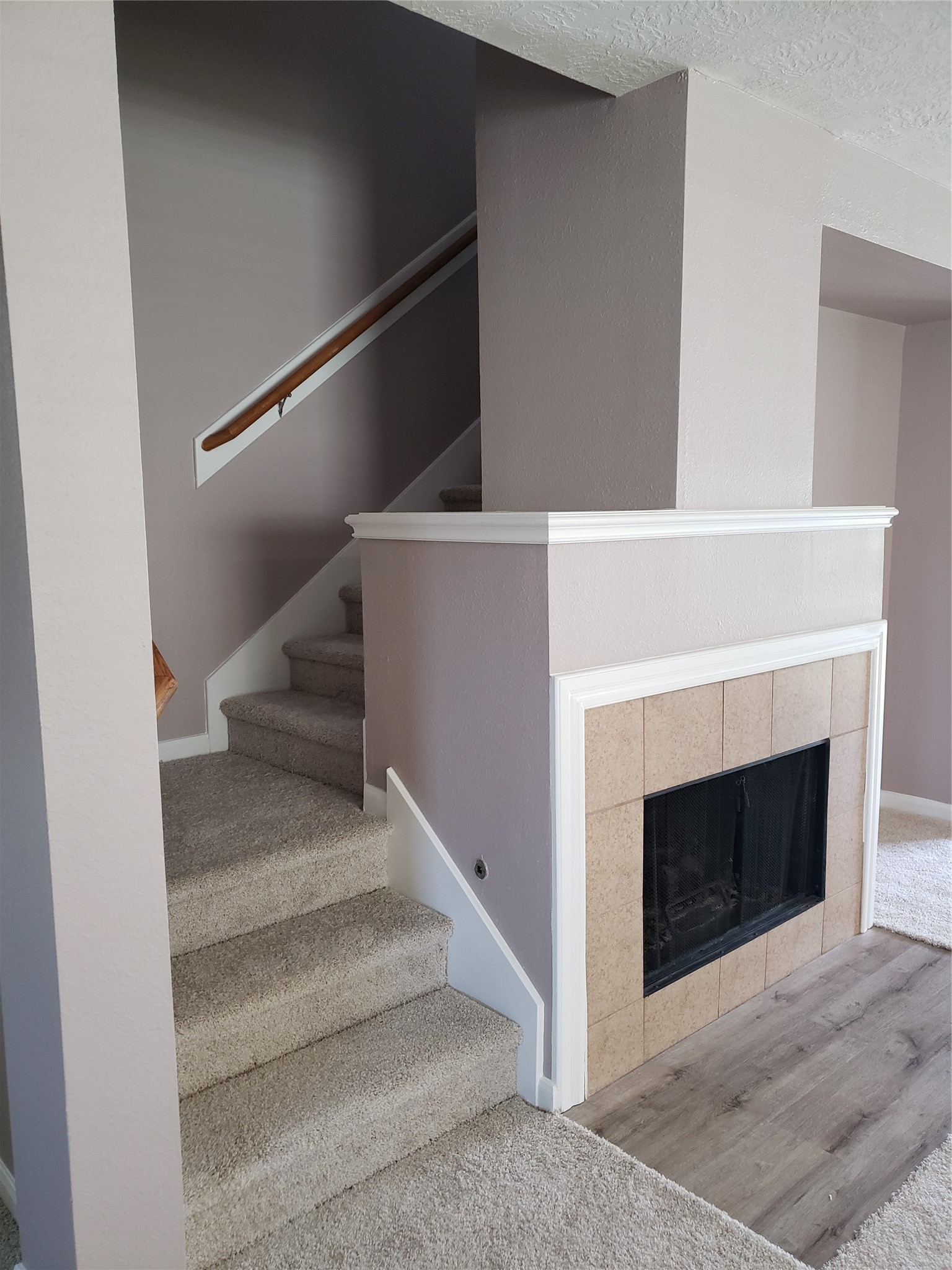 29314 Legends Bluff Drive Spring, TX 77386 - Photo 17 of 31 a view of staircase with fireplace