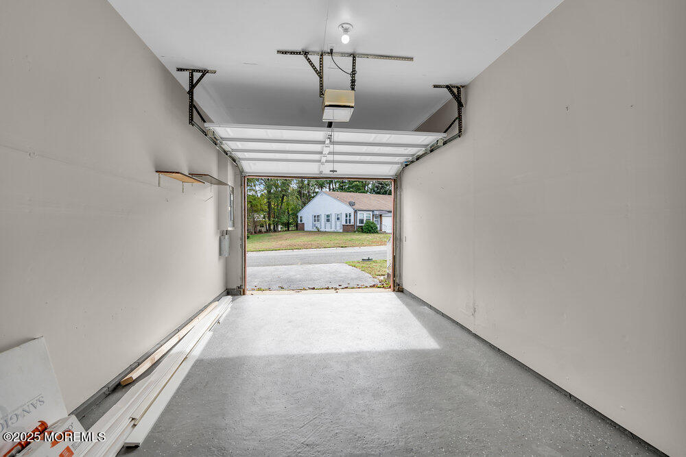 9B Juniper Lane, Unit 50 Whiting, NJ 08759 - Photo 26 of 28 a view of a hallway view with staircase