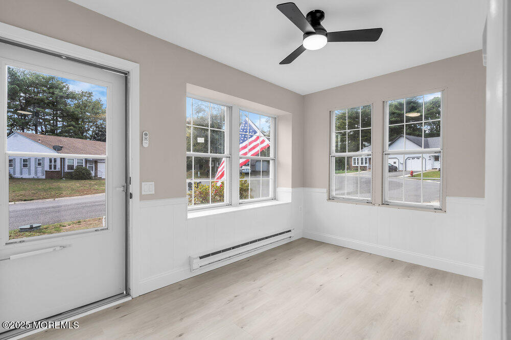 9B Juniper Lane, Unit 50 Whiting, NJ 08759 - Photo 6 of 28 a view of an empty room with a window