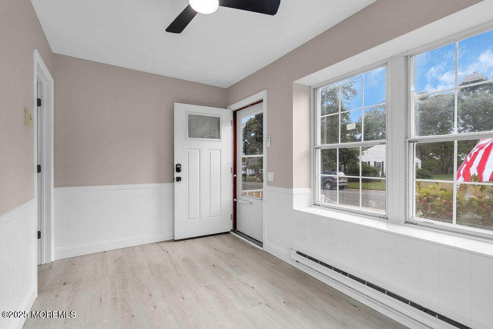 9B Juniper Lane, Unit 50 Whiting, NJ 08759 - Photo 7 of 28 an empty room with windows