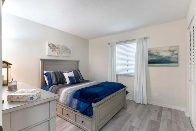 a view of swimming pool with outdoor seating