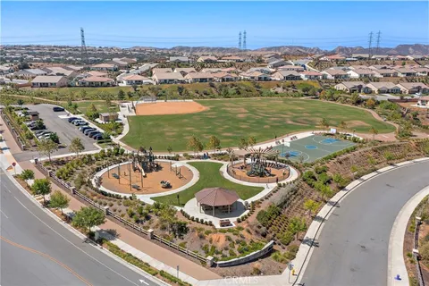 an aerial view of a house with outdoor space
