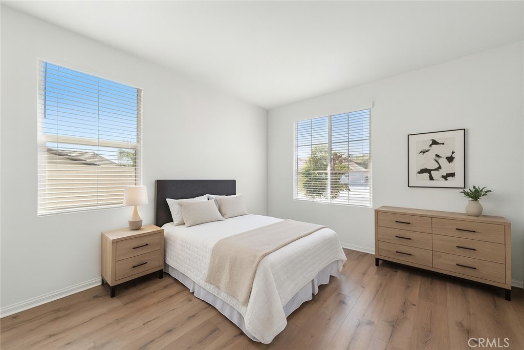 1537 Yucca Court Calimesa, CA 92320 - Photo 10 of 16 a bedroom with a bed and a dresser