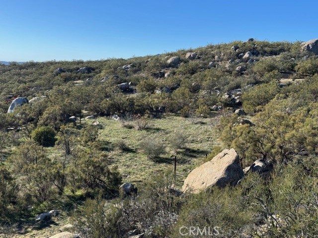 54740 Cave Rock Road Anza, CA 92539 - Photo 20 of 47 a view of a mountain in the distance in a field