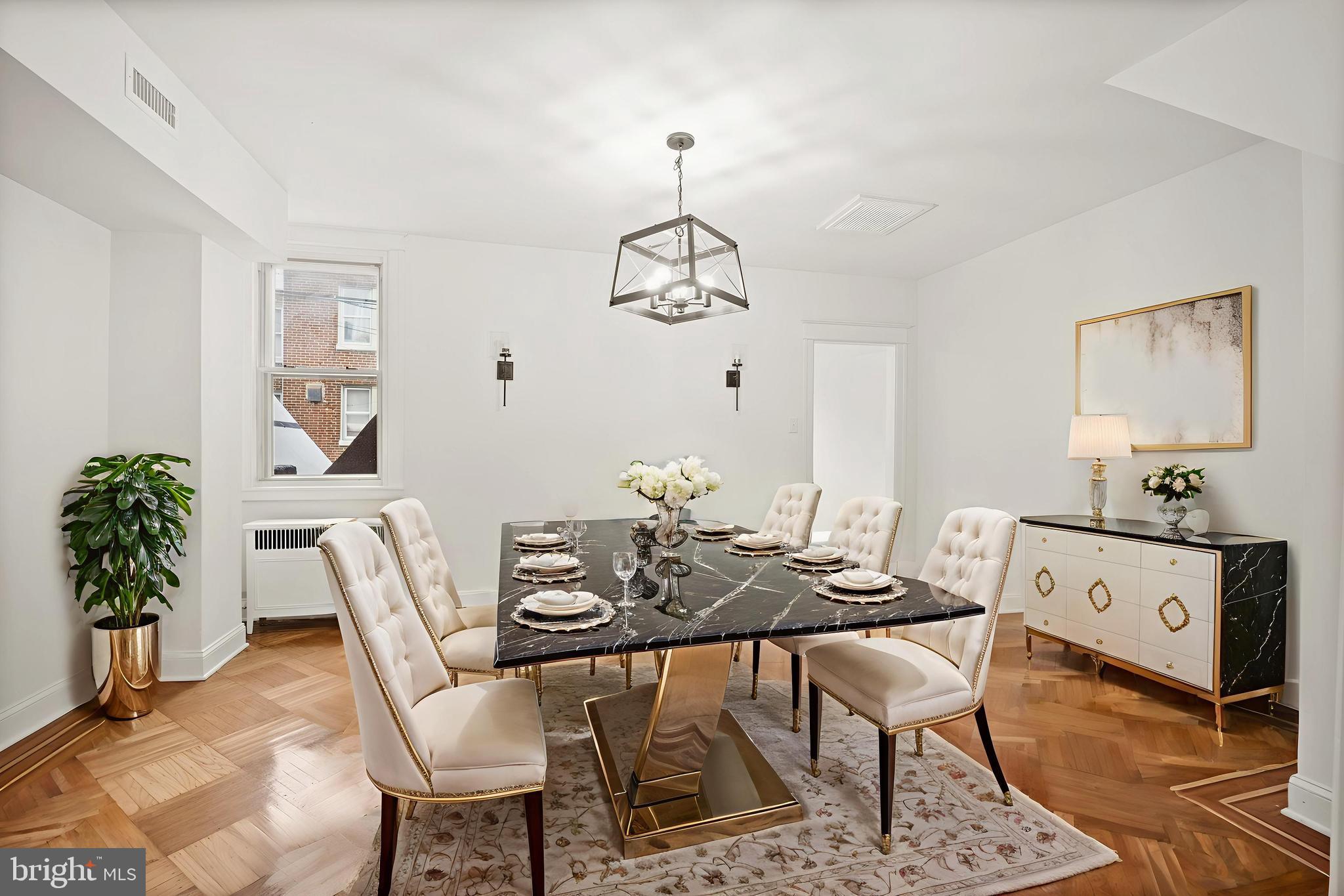 1969 Ashley Road Philadelphia, PA 19138 - Photo 3 of 12 a view of a dining room with furniture and wooden floor