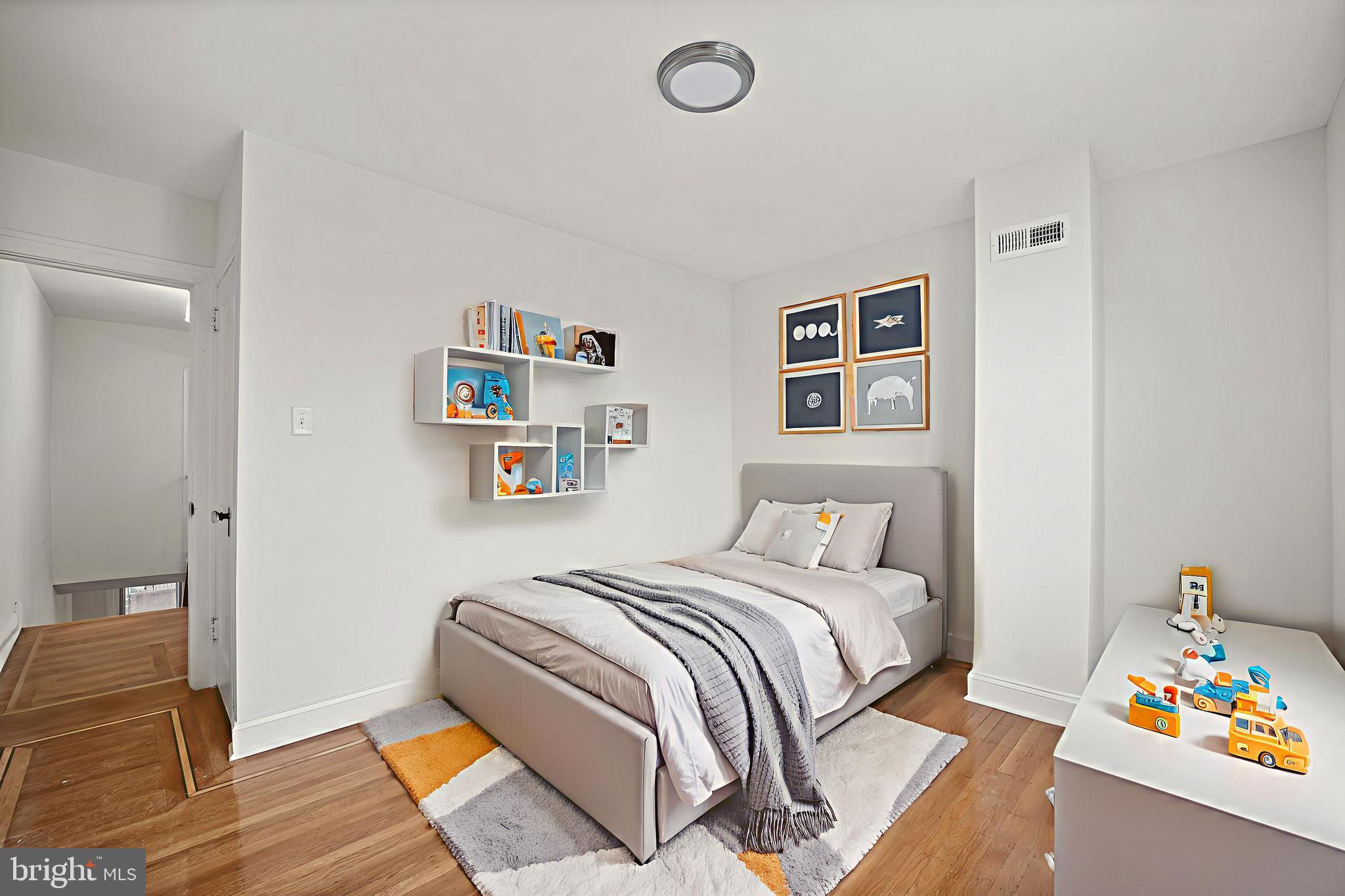 1969 Ashley Road Philadelphia, PA 19138 - Photo 6 of 12 a bedroom with a bed and a couch