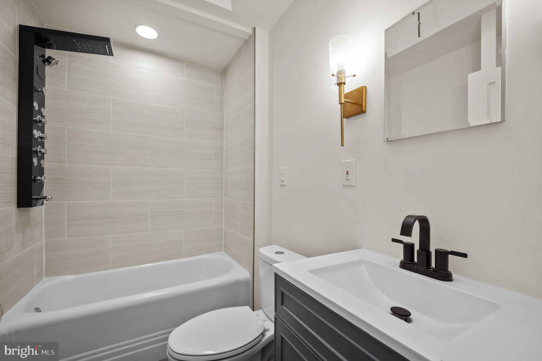 1969 Ashley Road Philadelphia, PA 19138 - Photo 8 of 12 a bathroom with a sink toilet and bathtub