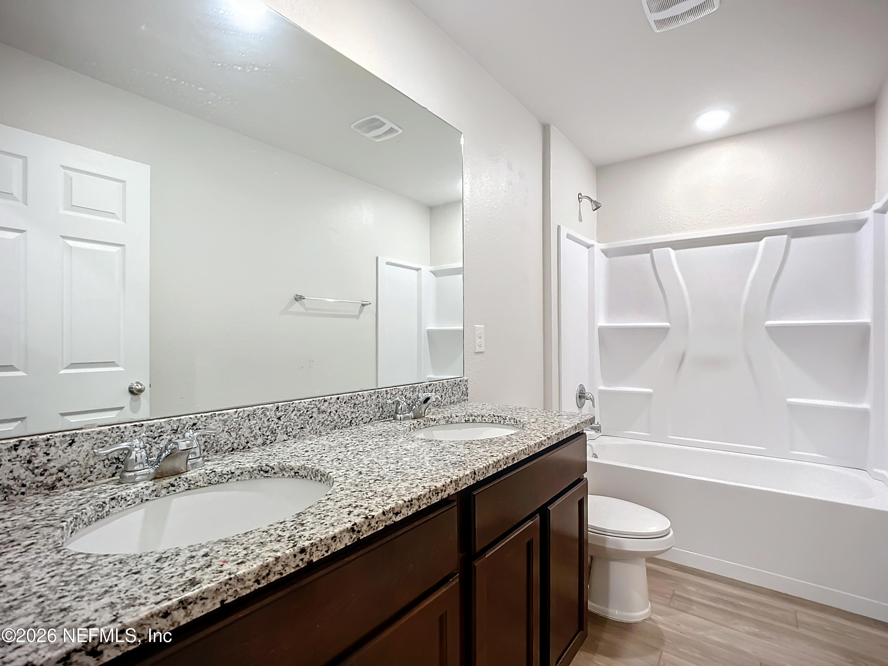 1360 Tan Tara Trail Jacksonville, FL 32221 - Photo 17 of 23 a bathroom with a granite countertop sink toilet and shower