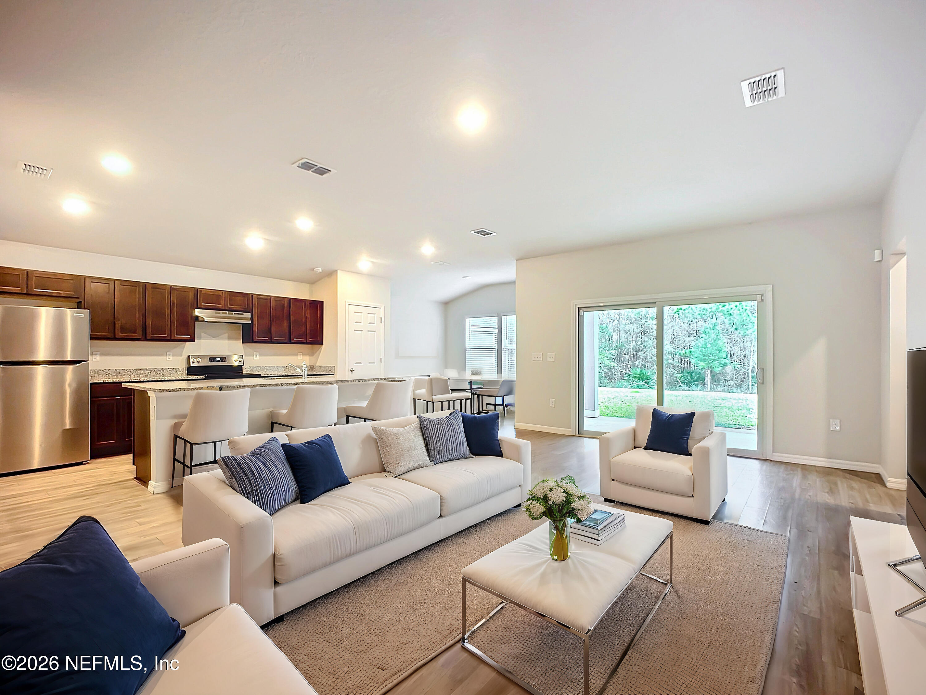 1360 Tan Tara Trail Jacksonville, FL 32221 - Photo 4 of 23 a living room with furniture and a view of kitchen