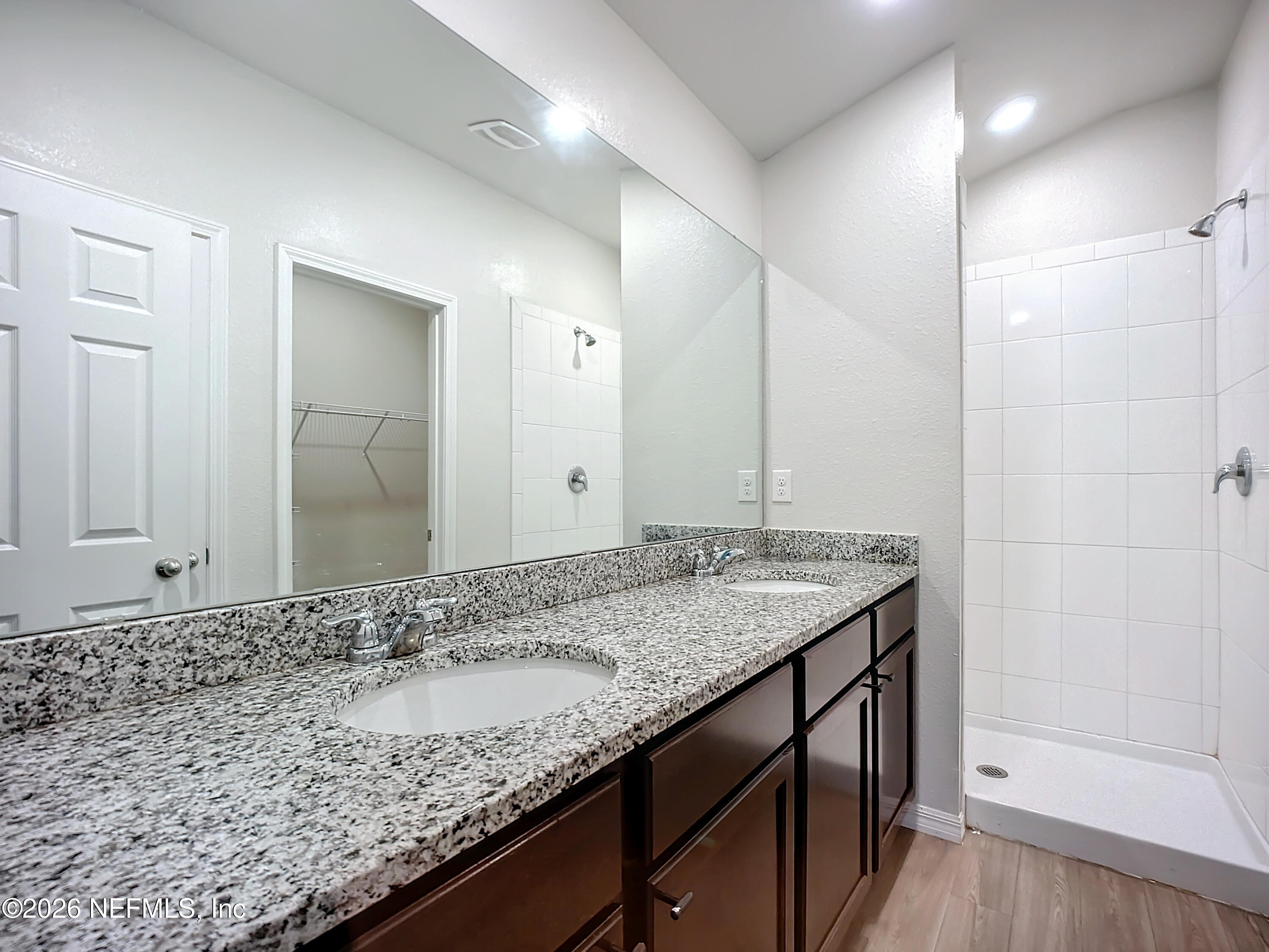 1360 Tan Tara Trail Jacksonville, FL 32221 - Photo 10 of 23 a bathroom with a granite countertop sink and a mirror