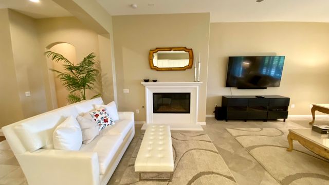 a bedroom with a bed and a table