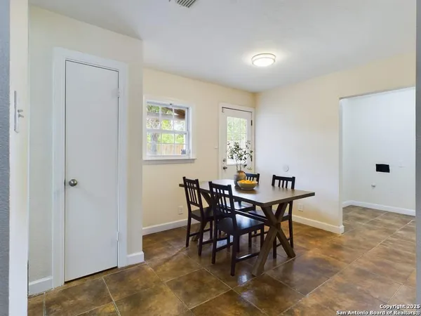 a view of a dining room with furniture