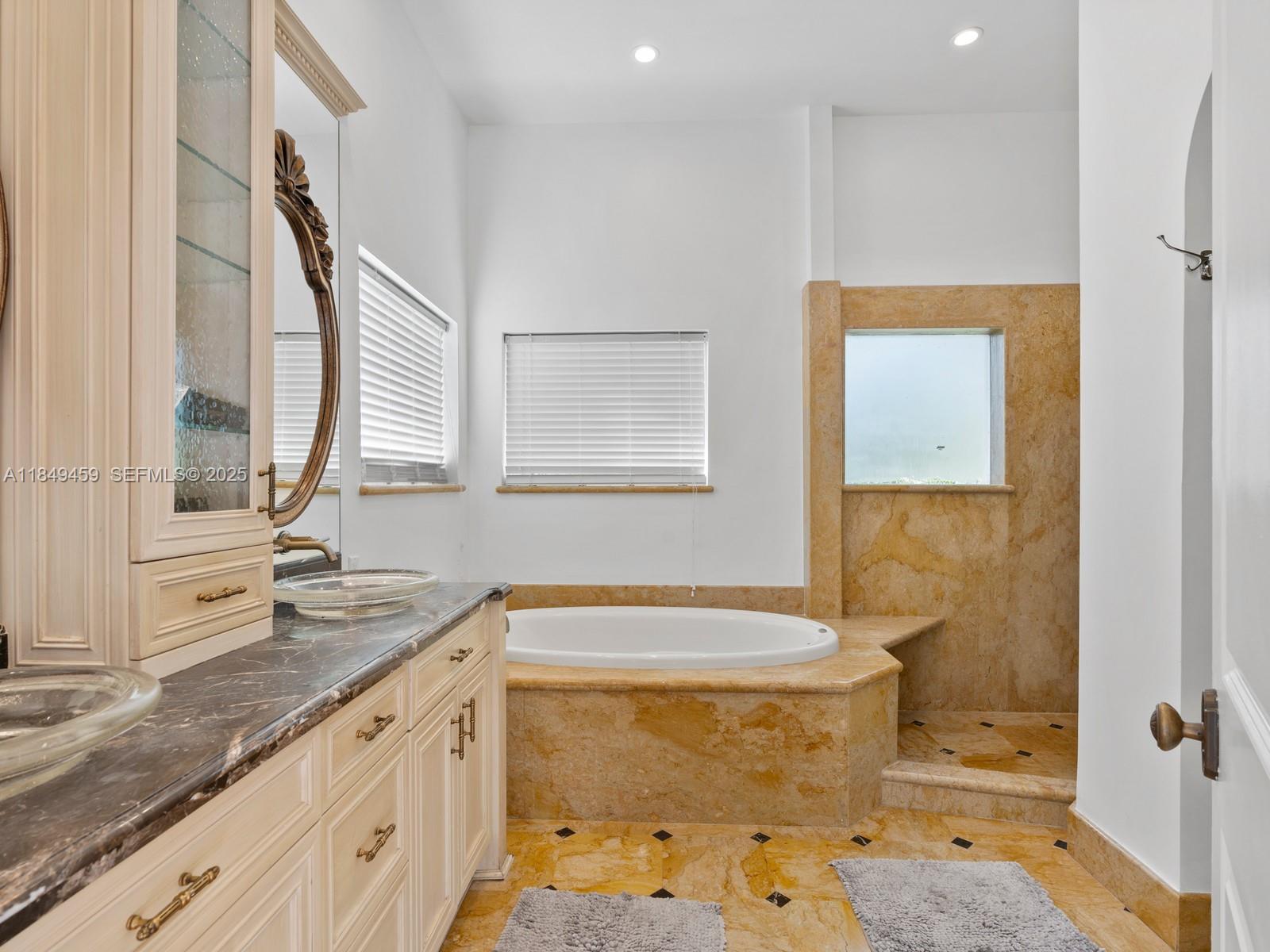 1223 Jackson Street Hollywood, FL 33019 - Photo 23 of 41 a bathroom with a granite countertop sink toilet and shower