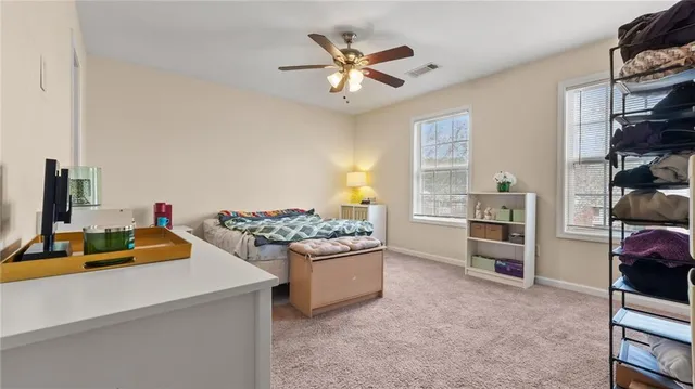 a living room with furniture and decor