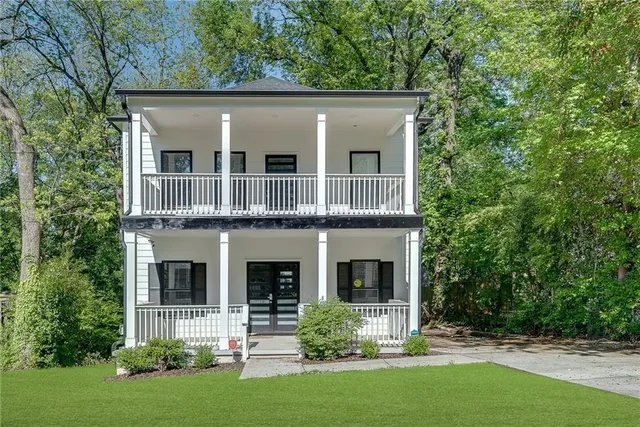 a view of house with yard