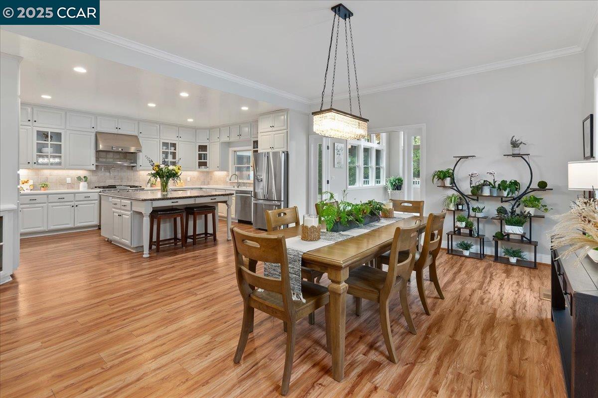 1101 North Gate Road Walnut Creek, CA 94598 - Photo 15 of 56 a view of a dining room with furniture window and wooden floor