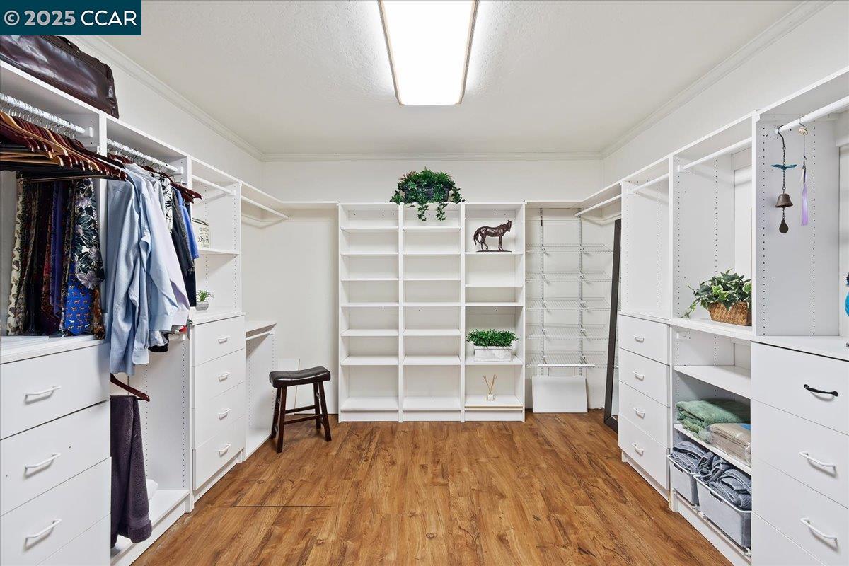1101 North Gate Road Walnut Creek, CA 94598 - Photo 20 of 56 a view of walk in closet with empty racks
