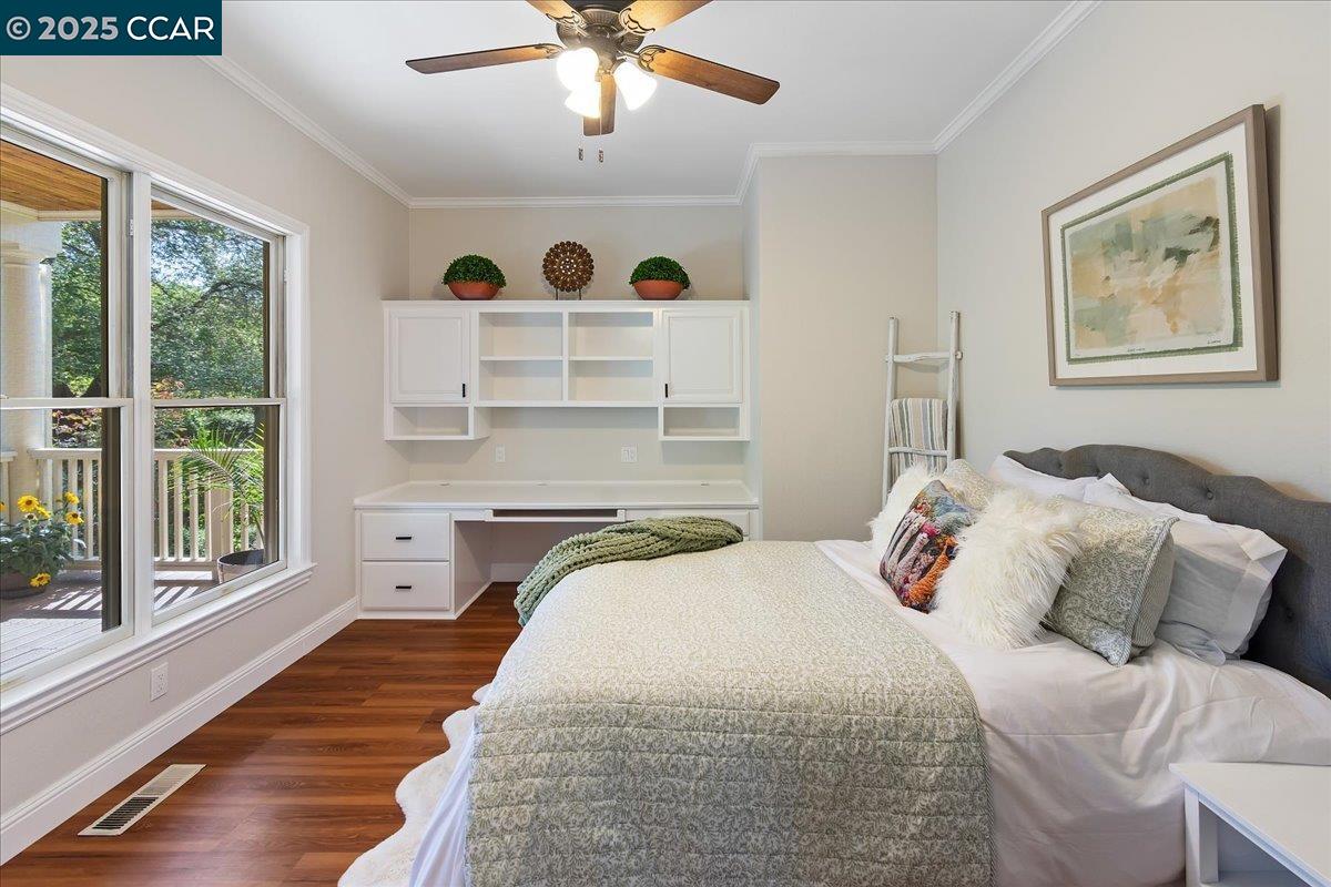 1101 North Gate Road Walnut Creek, CA 94598 - Photo 21 of 56 a bedroom with a large bed and a large window
