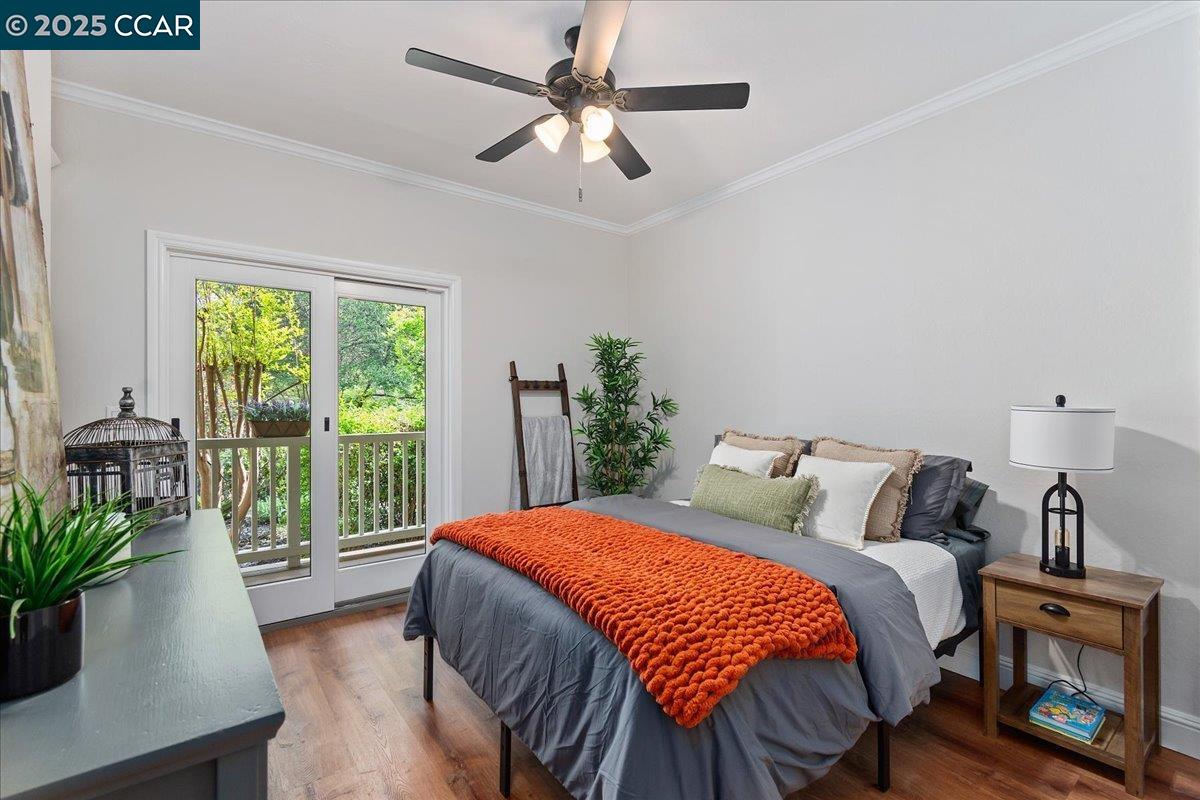 1101 North Gate Road Walnut Creek, CA 94598 - Photo 23 of 56 a bedroom with a large bed and a potted plant