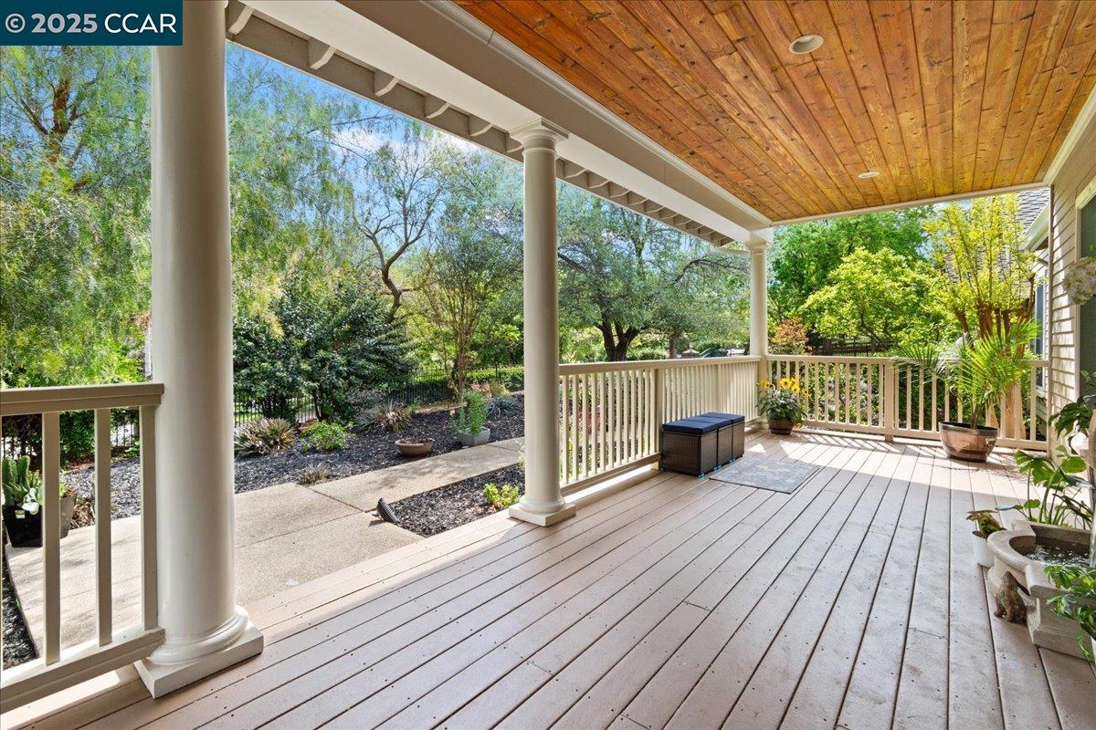 1101 North Gate Road Walnut Creek, CA 94598 - Photo 3 of 56 a view of a room with wooden floor and iron stairs