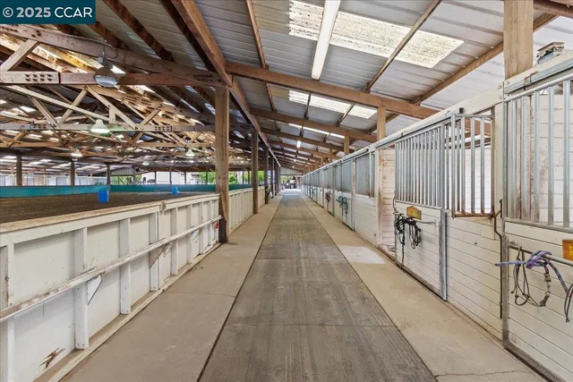 a view of a tables and chairs in the patio