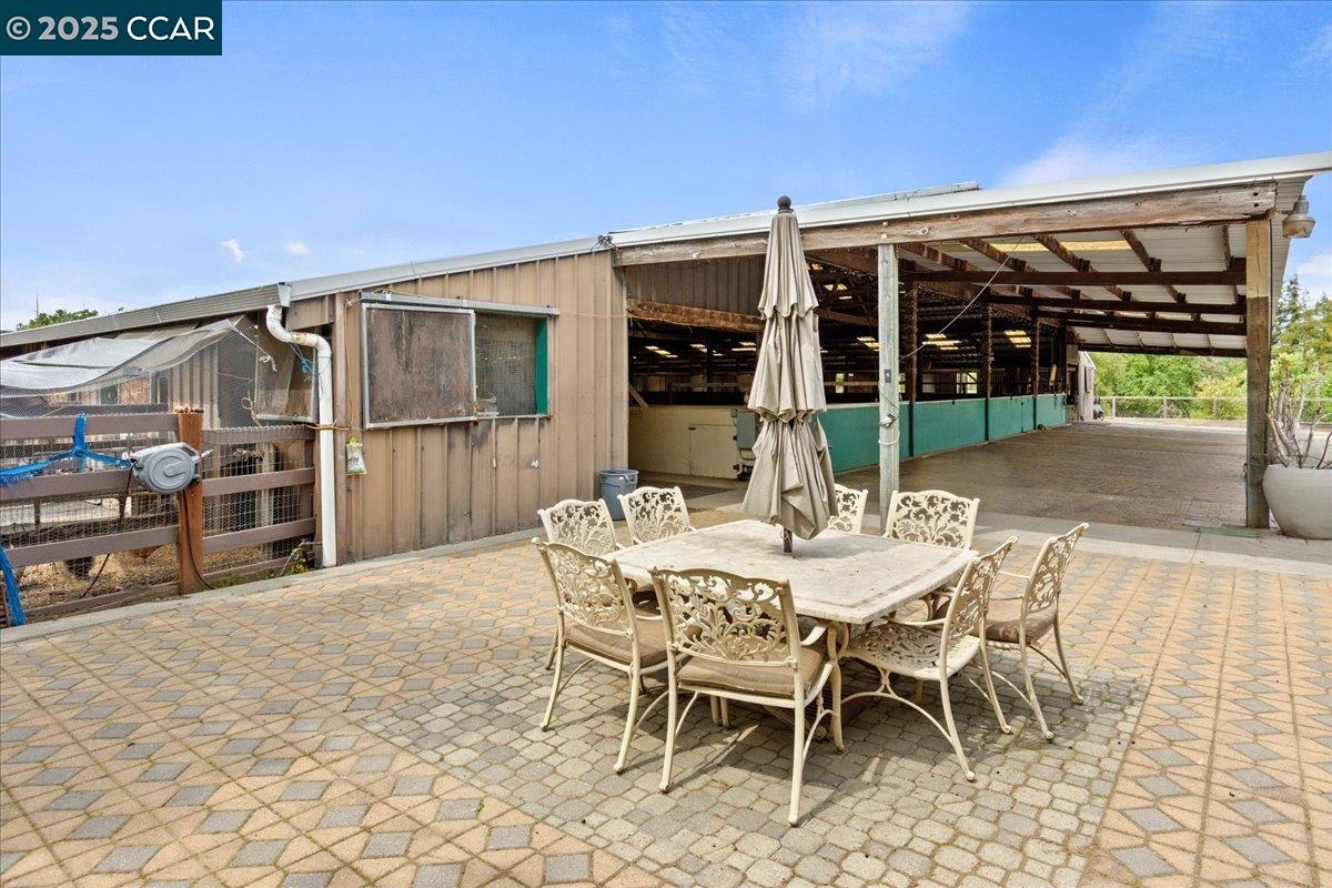 1101 North Gate Road Walnut Creek, CA 94598 - Photo 36 of 56 a backyard of a house with table and chairs