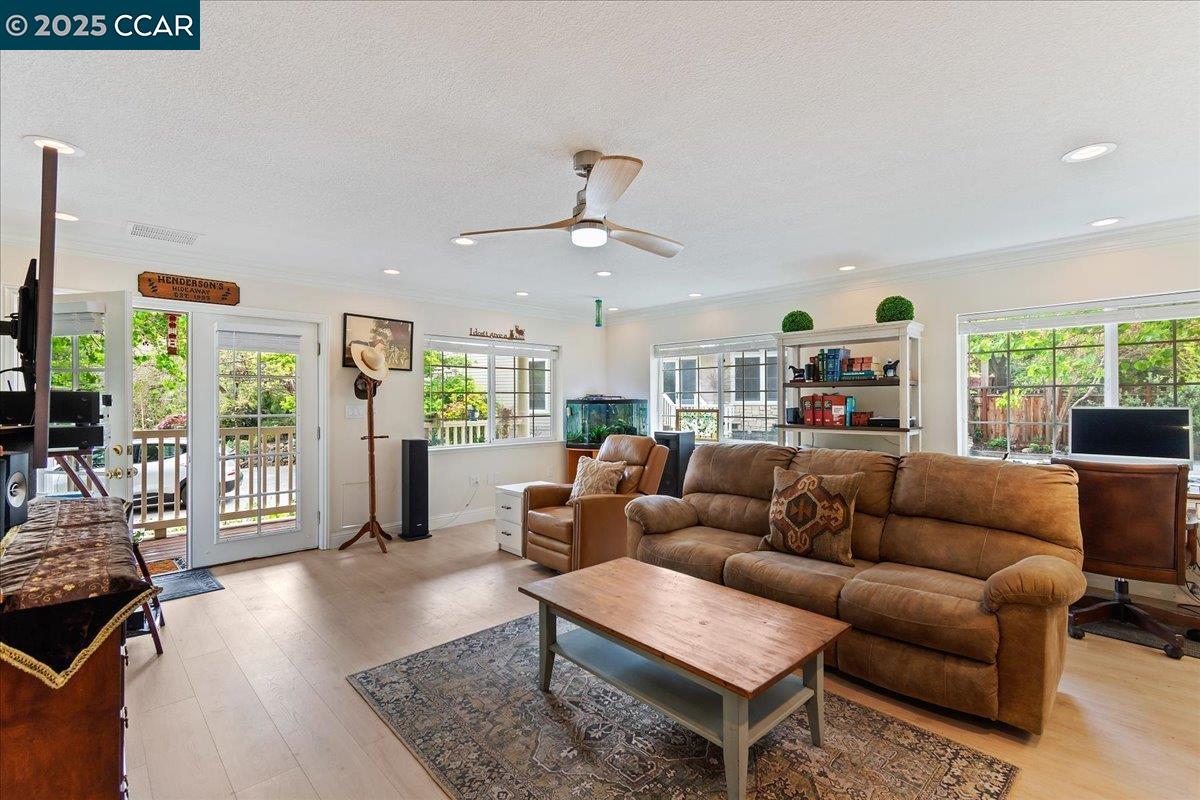 1101 North Gate Road Walnut Creek, CA 94598 - Photo 42 of 56 a living room with furniture and a large window