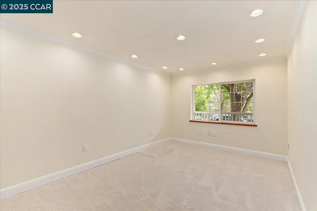 a view of a house with a backyard porch and sitting area