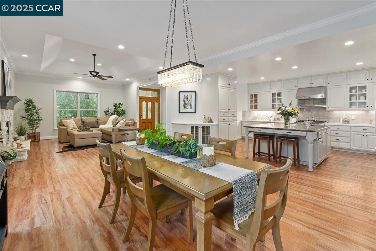 1101 North Gate Road Walnut Creek, CA 94598 - Photo 6 of 56 a view of a dining room with furniture and wooden floor