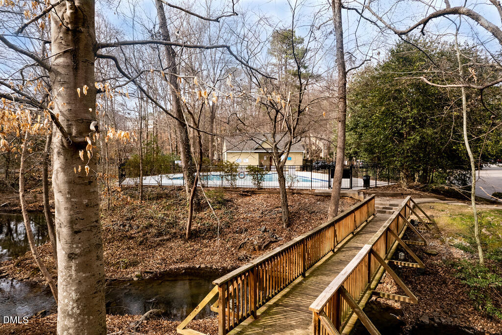 412 Oak Hollow Court Raleigh, NC 27613 - Photo 22 of 24 a view of a pathway with a yard