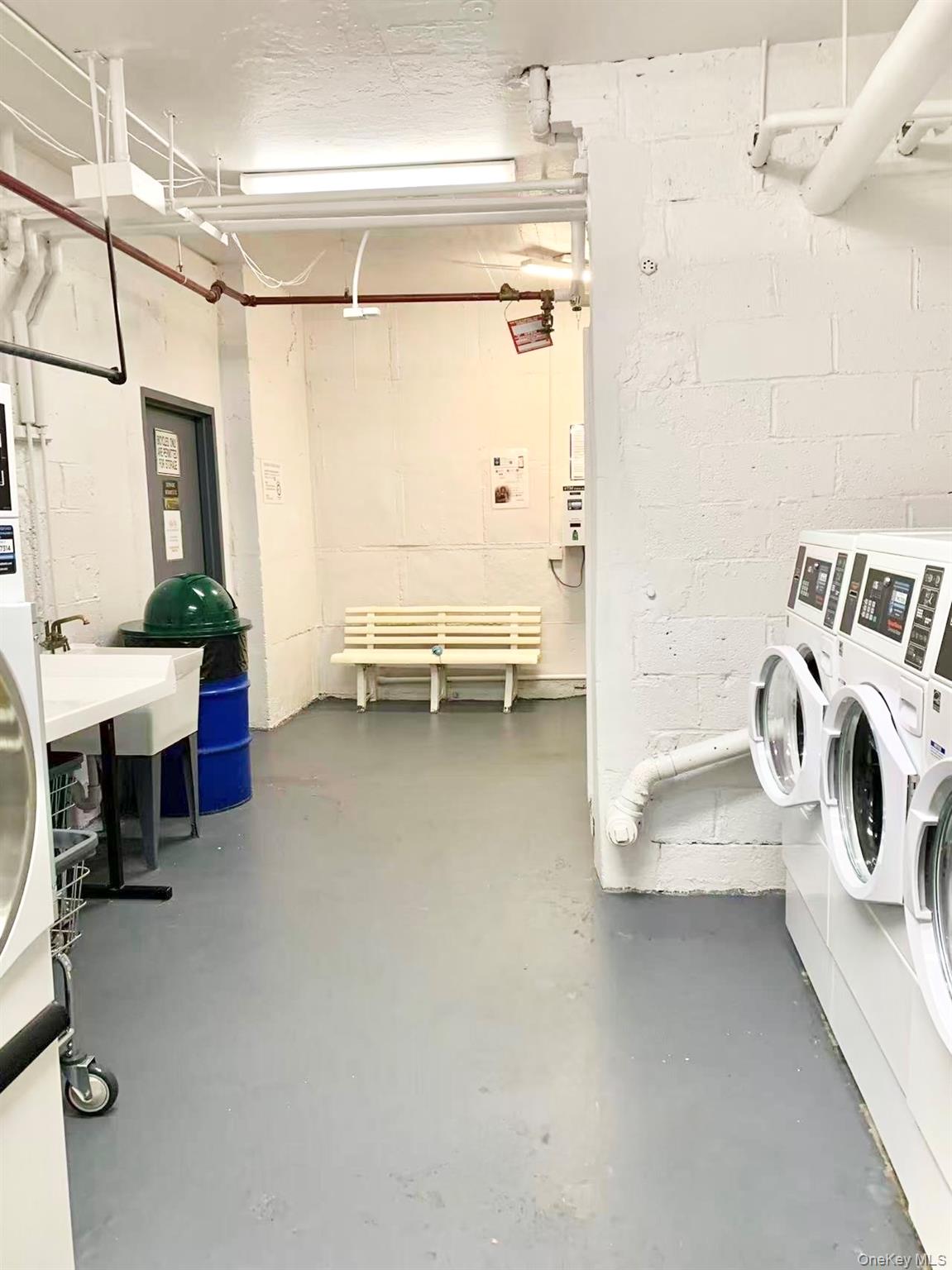 43-35 Union Street, Unit 2G Queens, NY 11355 - Photo 15 of 15 a utility room with dryer and washer