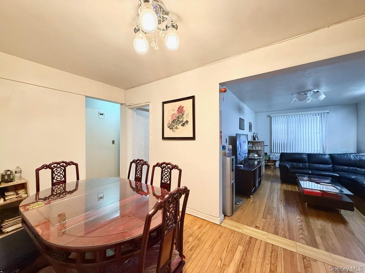 43-35 Union Street, Unit 2G Queens, NY 11355 - Photo 5 of 15 a view of a dining room with furniture and wooden floor
