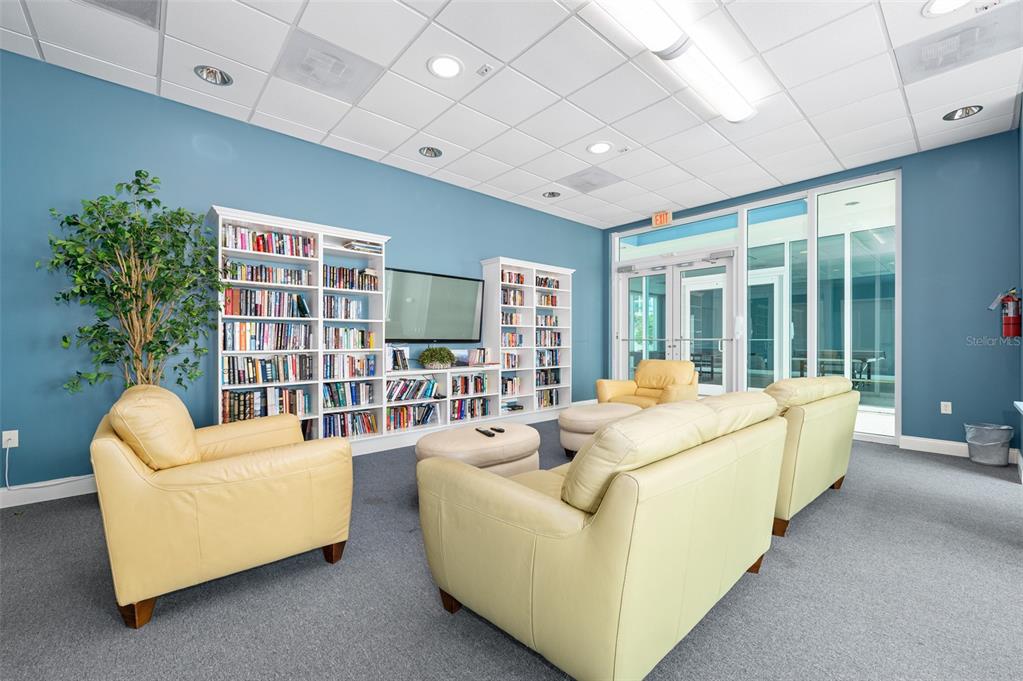 231 Riverside Drive, Unit 2081 Holly Hill, FL 32117 - Photo 33 of 38 a living room with furniture and a large window