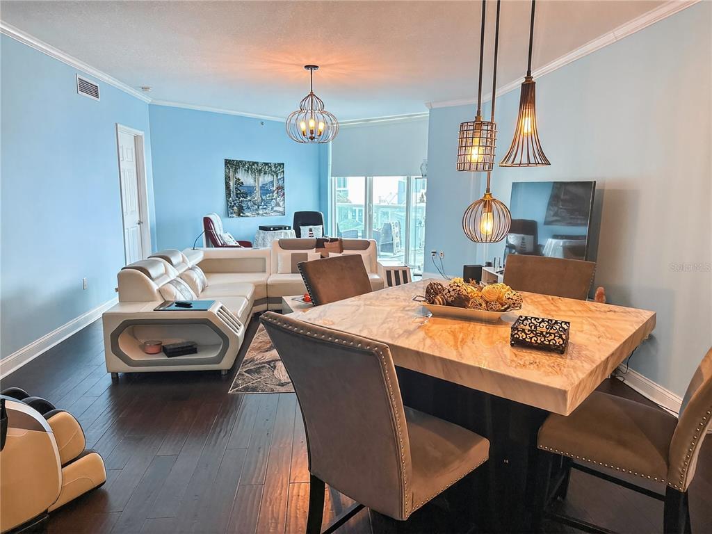 231 Riverside Drive, Unit 2081 Holly Hill, FL 32117 - Photo 4 of 38 a view of a dining room with furniture