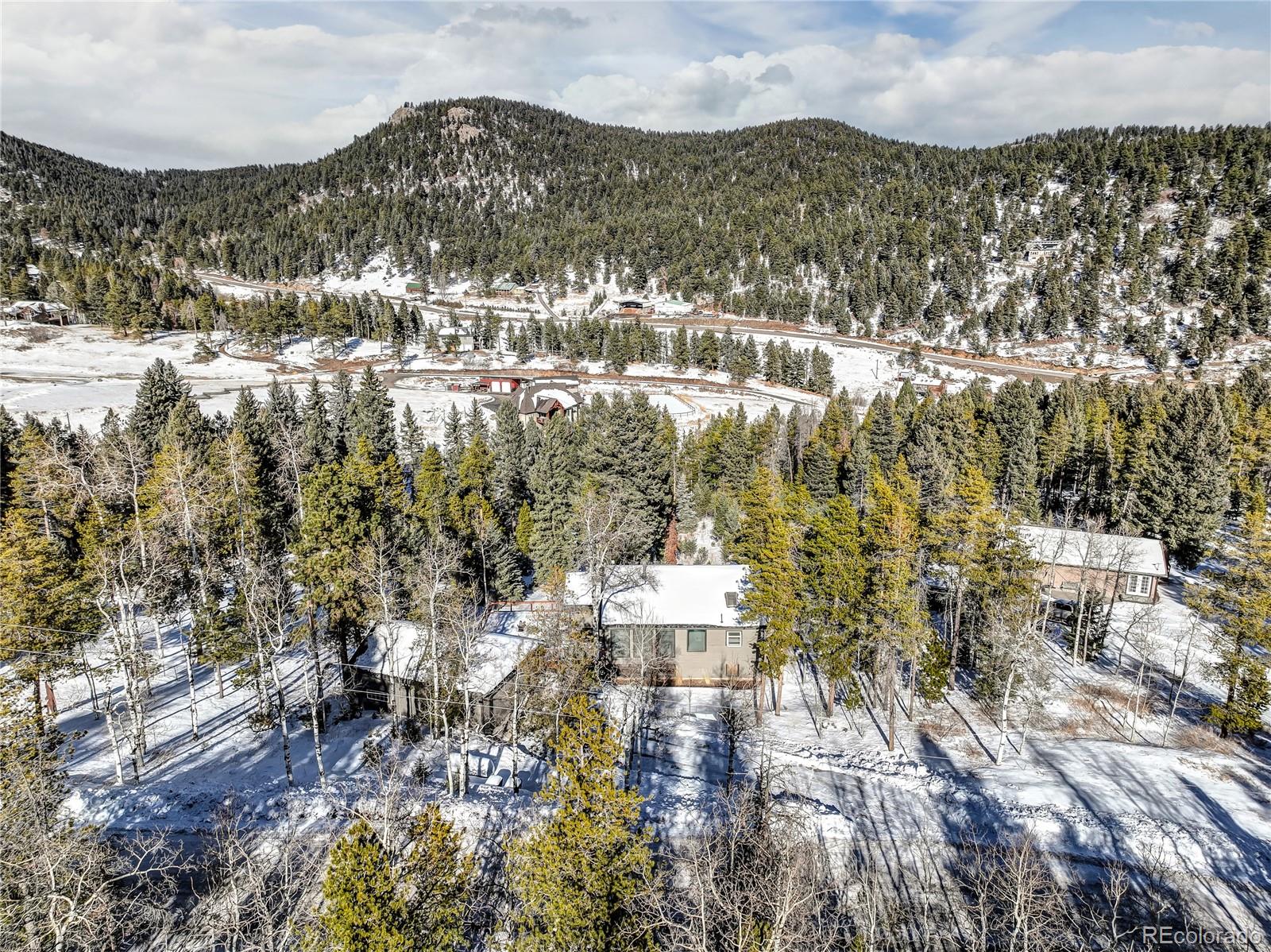 19273 Silver Ranch Road Conifer, CO 80433 - Photo 4 of 37 a view of city and mountain