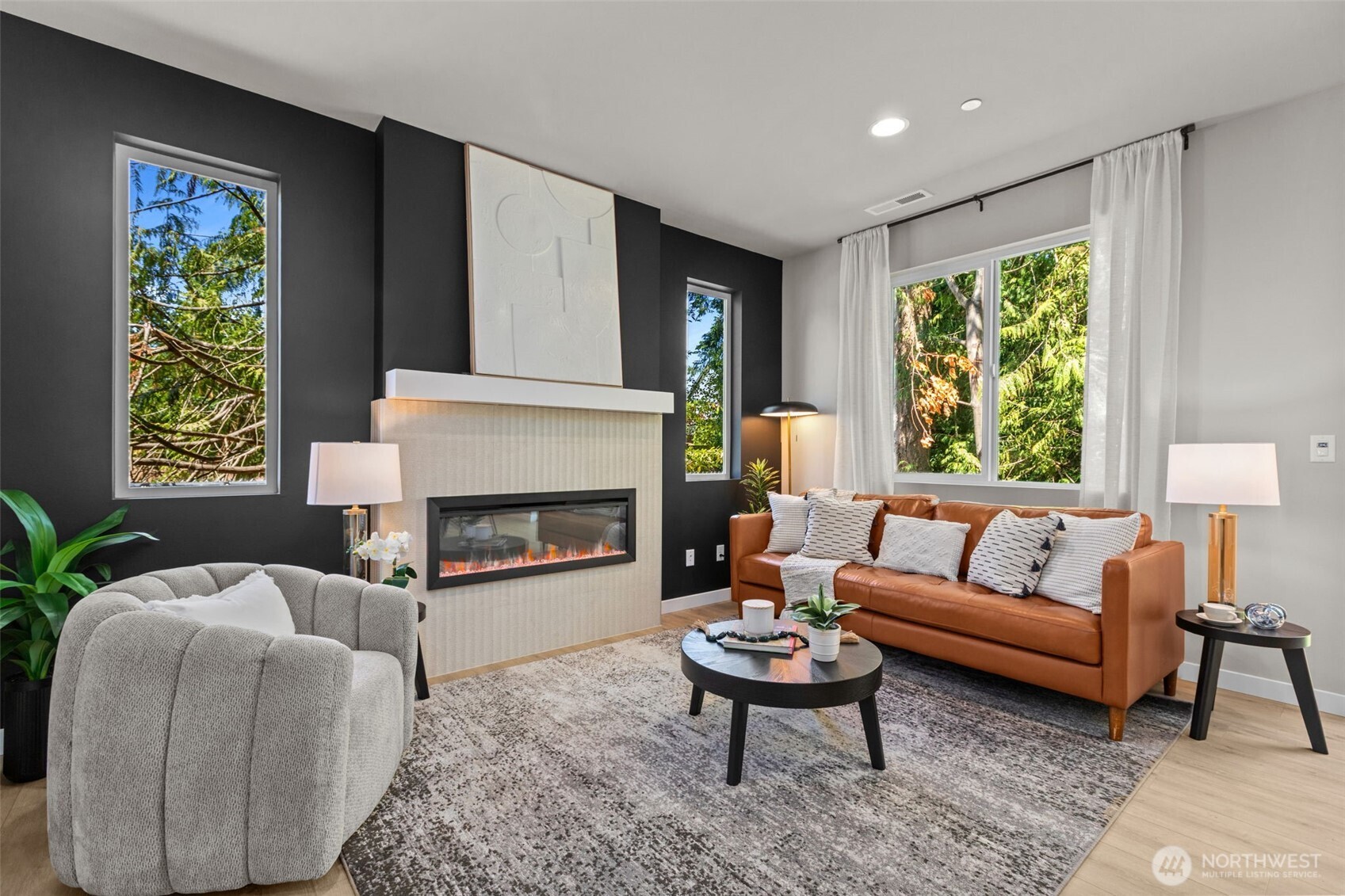 114 A 169th Place Southwest Bothell, WA 98012 - Photo 12 of 31 a living room with furniture and a fireplace