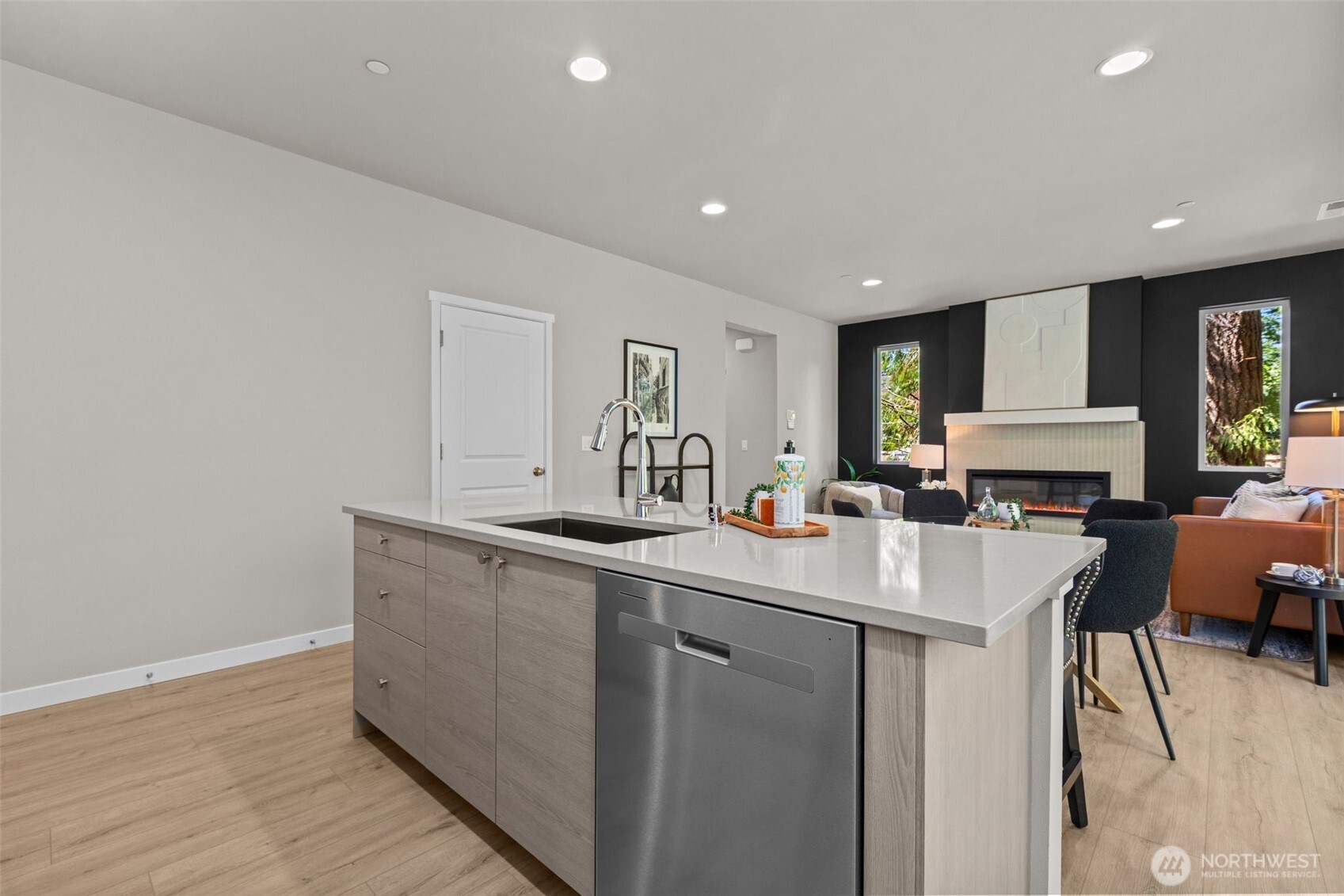 114 A 169th Place Southwest Bothell, WA 98012 - Photo 10 of 31 a kitchen with a sink cabinets and wooden floor