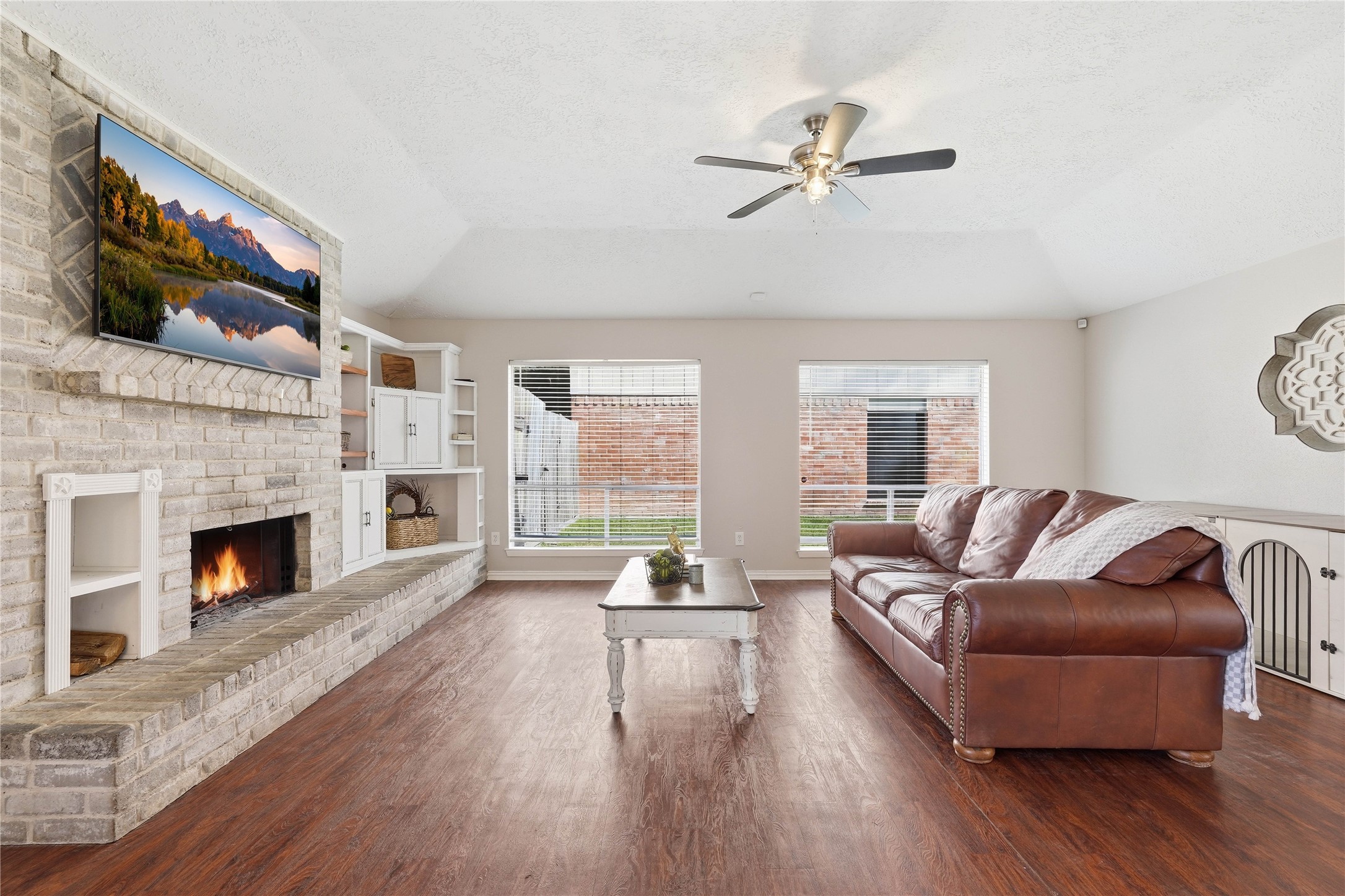 4506 Pineville Lane Spring, TX 77388 - Photo 12 of 33 a living room with furniture fireplace and flat screen tv
