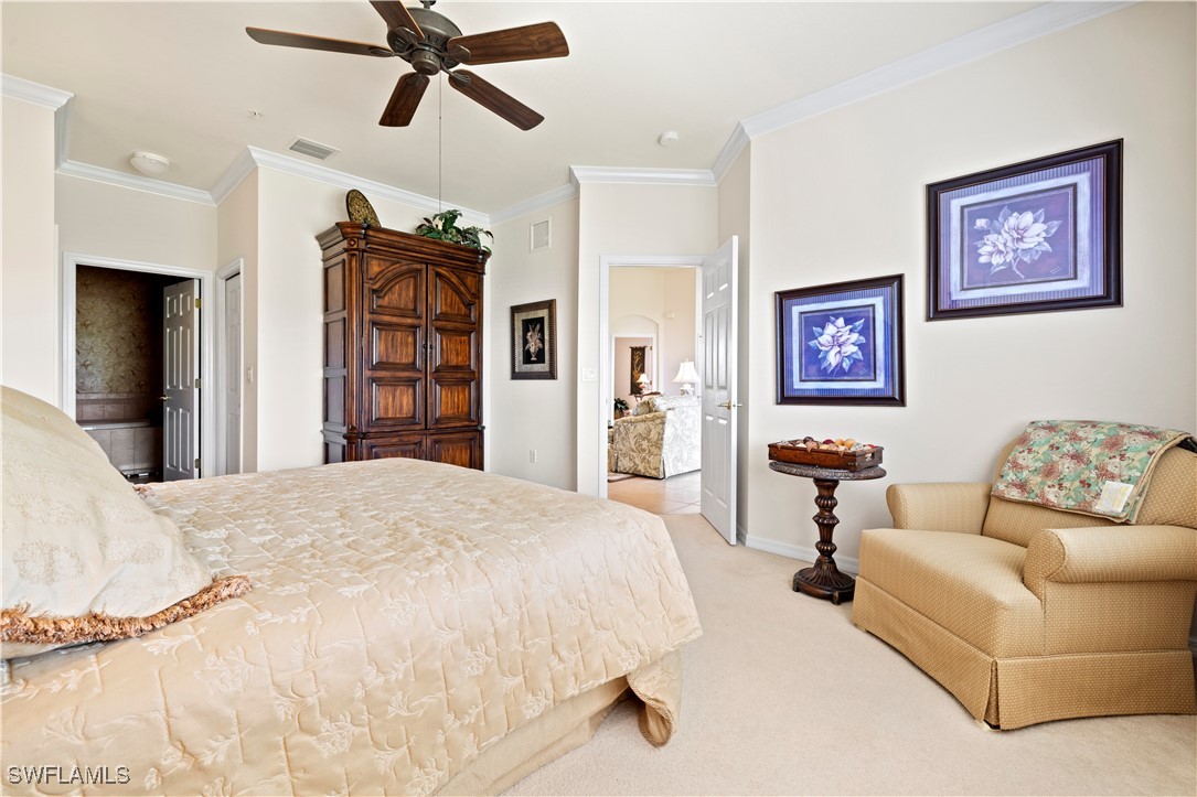 14941 Reflection Key Circle, Unit 621 Fort Myers, FL 33907 - Photo 19 of 42 a living room with furniture and a window