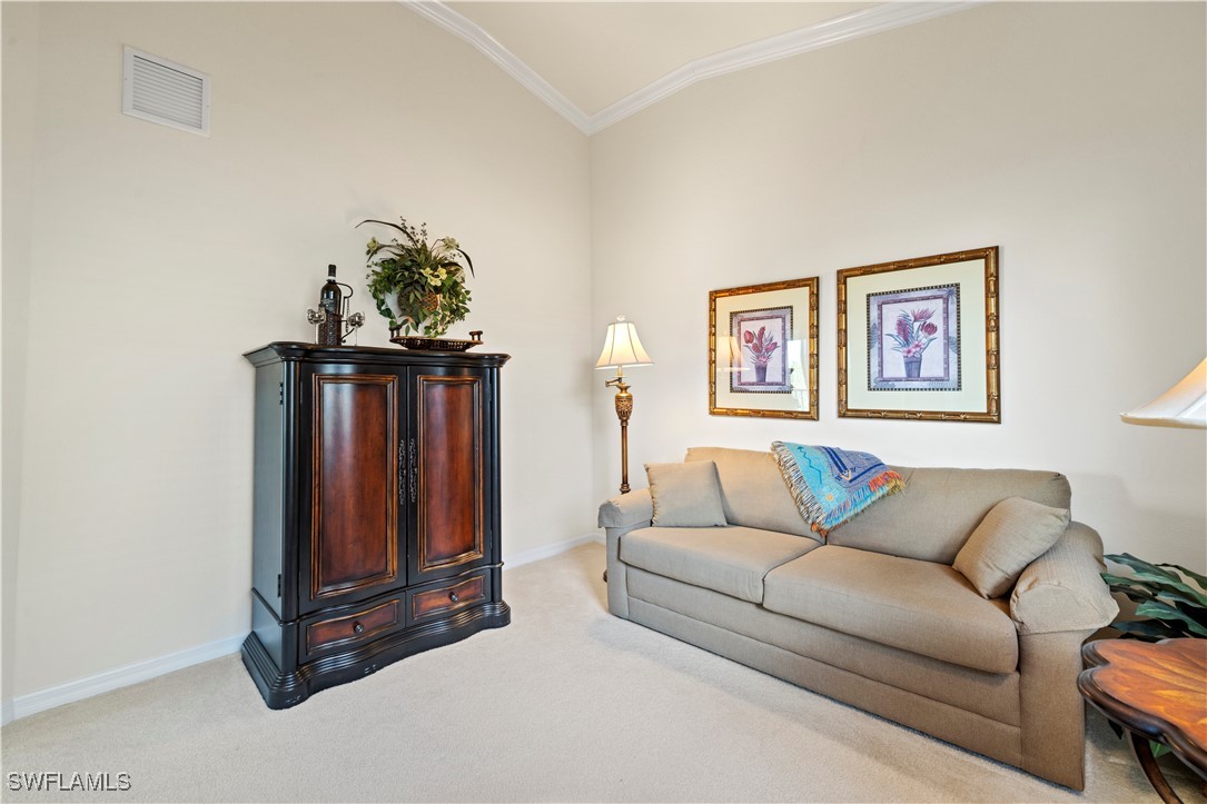 14941 Reflection Key Circle, Unit 621 Fort Myers, FL 33907 - Photo 23 of 42 a living room with furniture