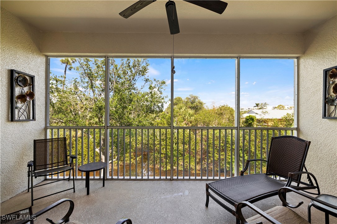14941 Reflection Key Circle, Unit 621 Fort Myers, FL 33907 - Photo 24 of 42 a view of a balcony with chairs