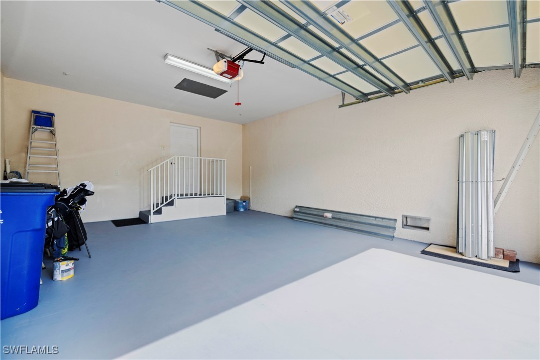 14941 Reflection Key Circle, Unit 621 Fort Myers, FL 33907 - Photo 26 of 42 a view of a livingroom with gym equipment