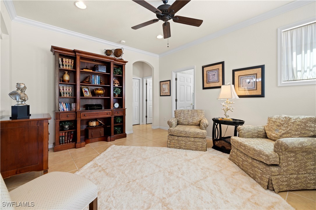 14941 Reflection Key Circle, Unit 621 Fort Myers, FL 33907 - Photo 6 of 42 a living room with furniture and walk in closet