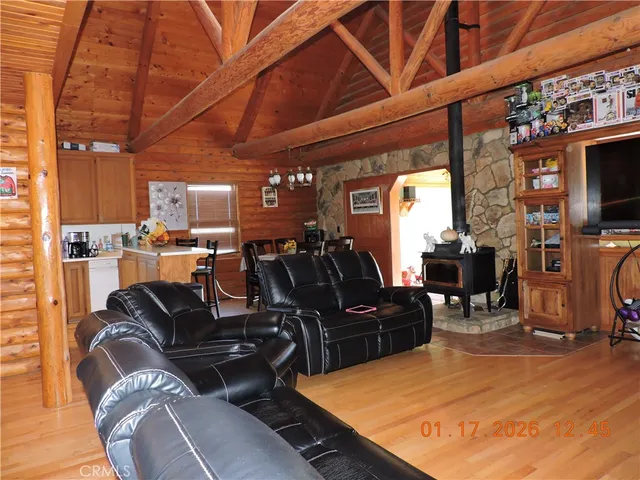a bathroom with a sink toilet and window