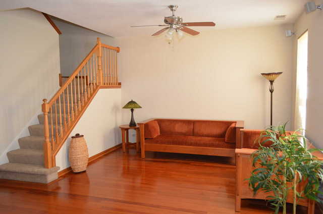 2548 Congress Avenue Aurora, IL 60503 - Photo 3 of 22 a living room with couches and a coffee table with wooden floor